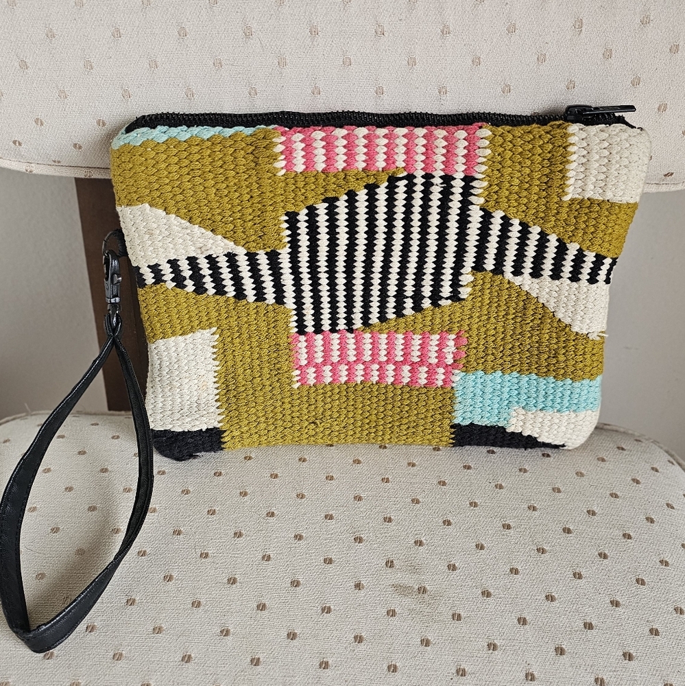 Urban Outfitters woven clutch